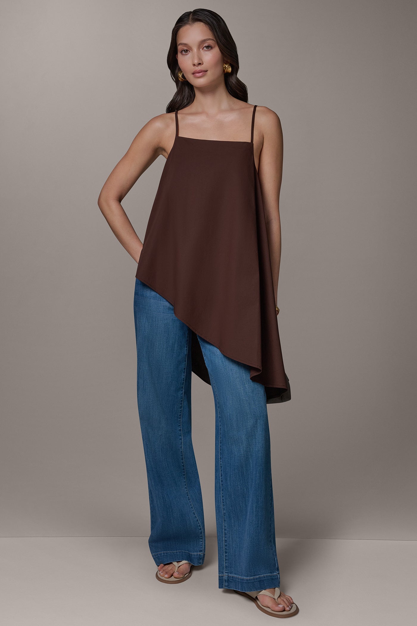 SLEEVELESS ASYMMETRIC TIE BACK BLOUSE