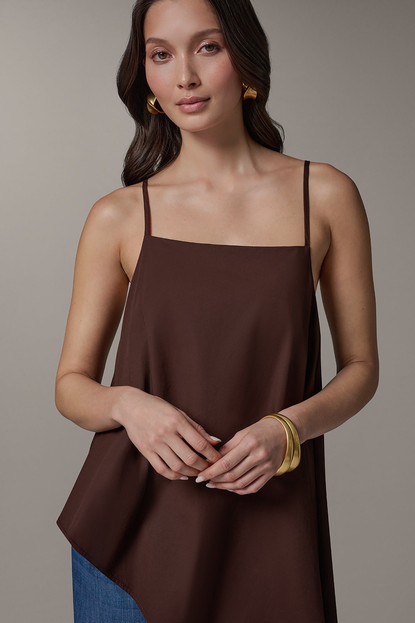 SLEEVELESS ASYMMETRIC TIE BACK BLOUSE