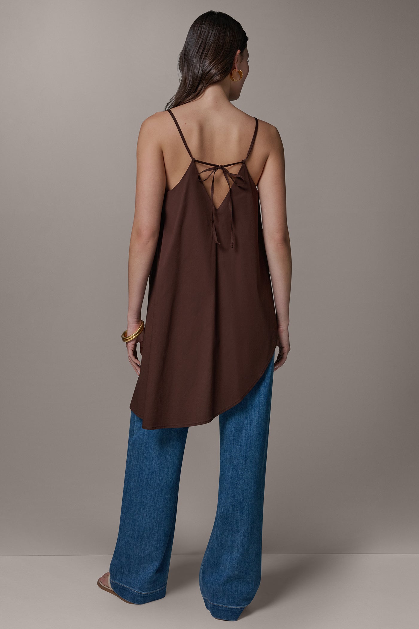 SLEEVELESS ASYMMETRIC TIE BACK BLOUSE